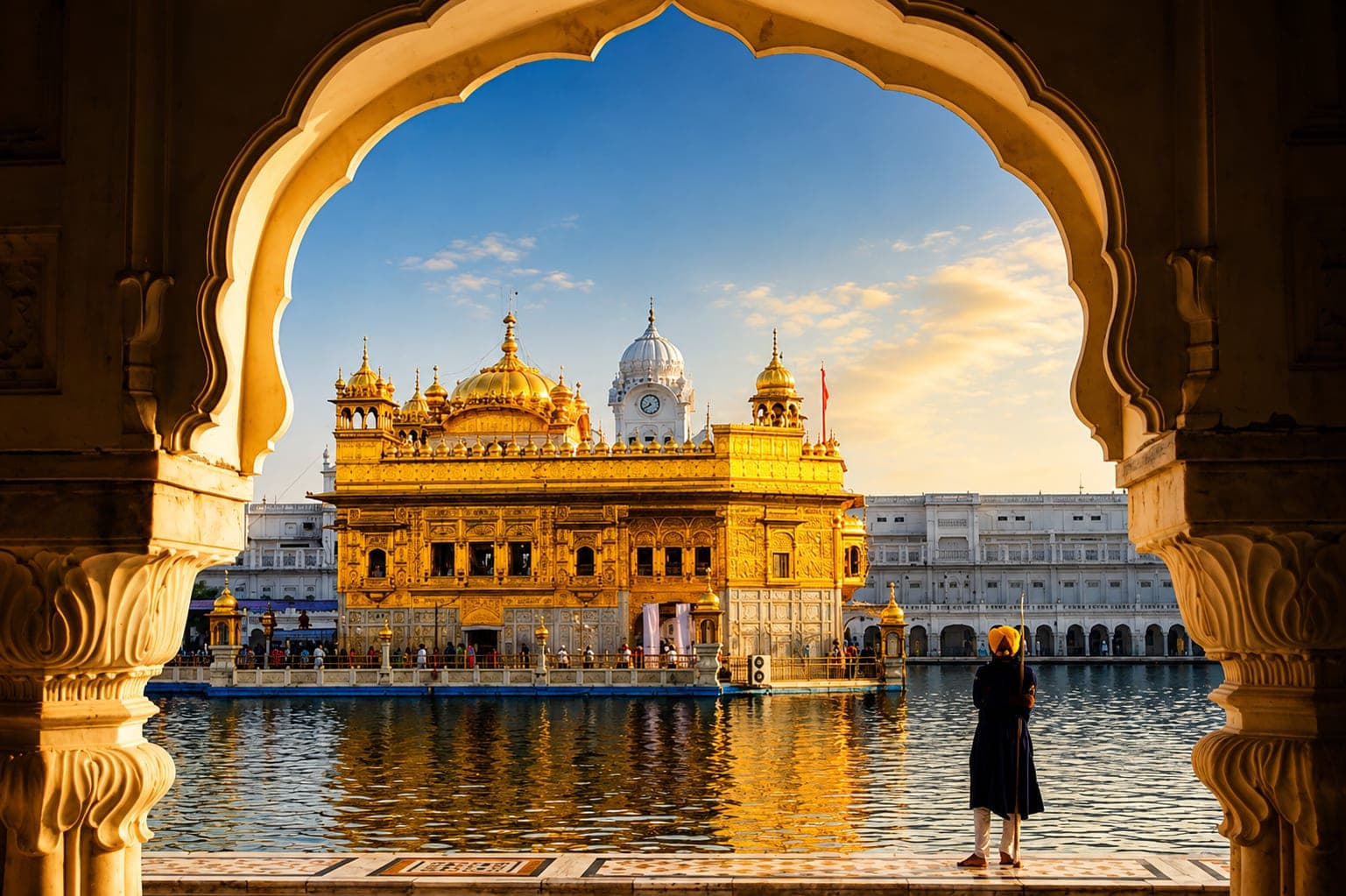 The Golden Temple framed through an archway in Amritsar