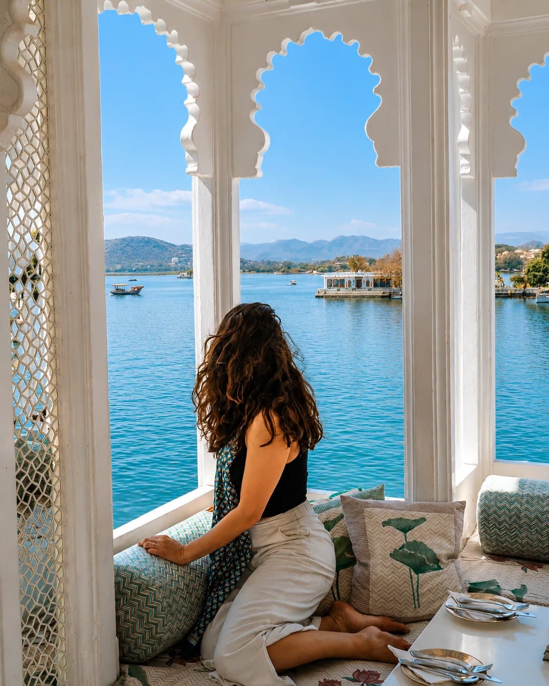 A lakeside balcony view over Lake Pichola in Udaipur