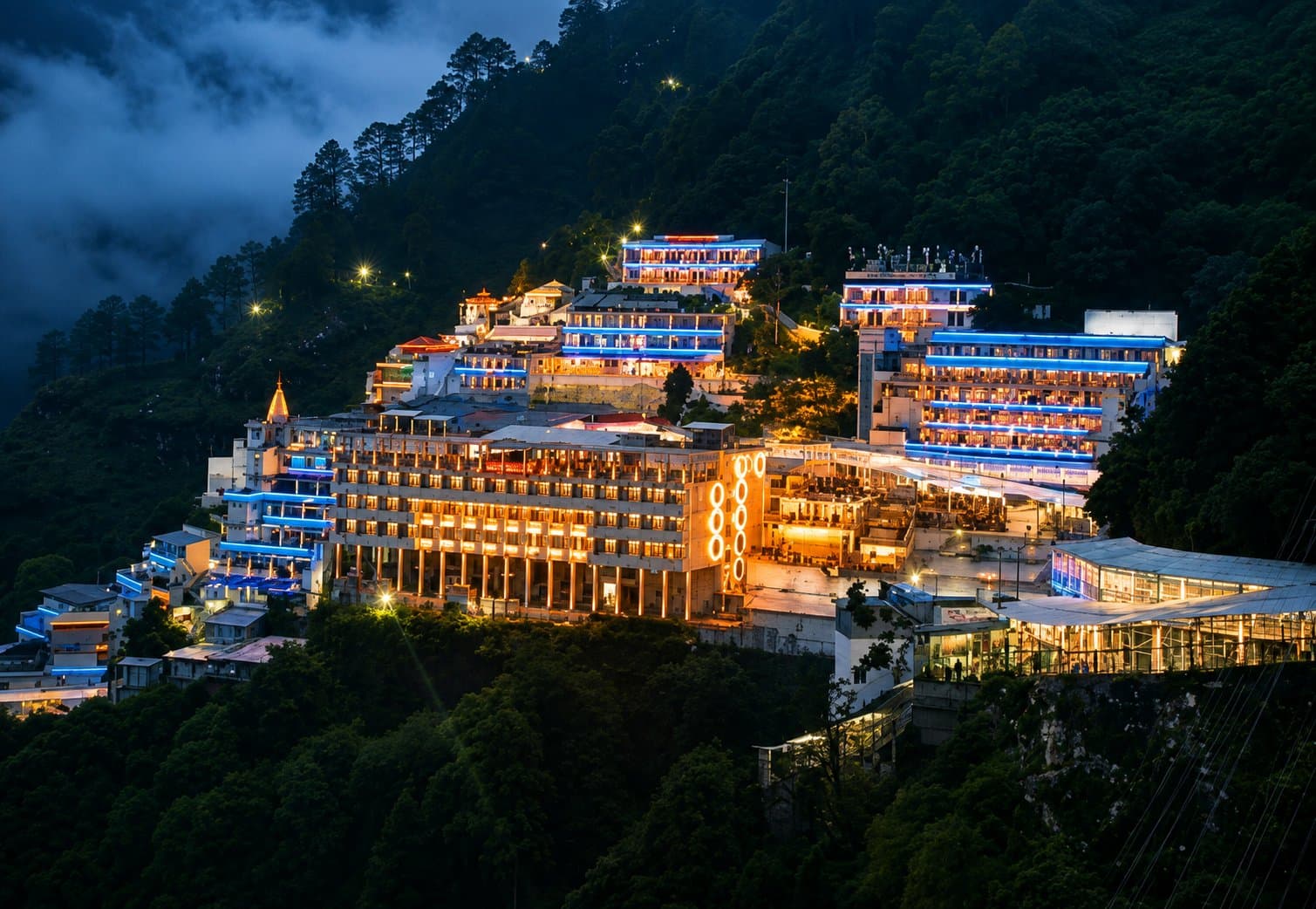 The Vaishno Devi shrine complex lit up at night near Katra